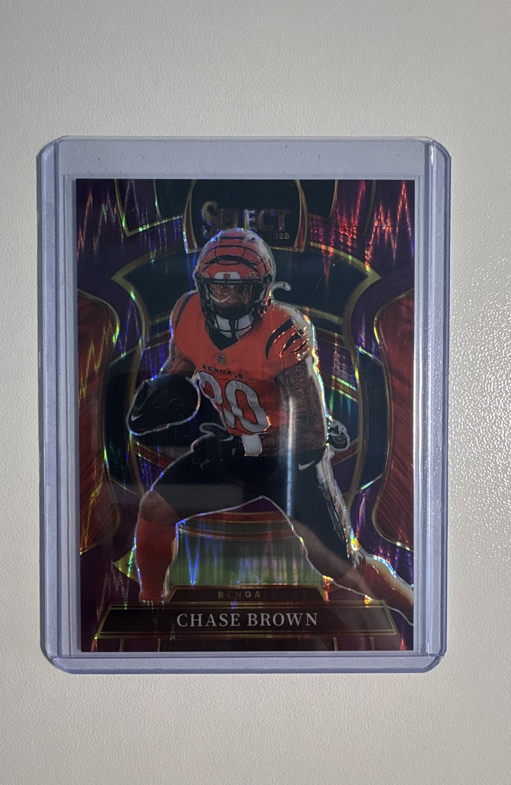 2025 Panini Select Concourse Chase Brown #59 Purple Shock Prizm /699 Bengals