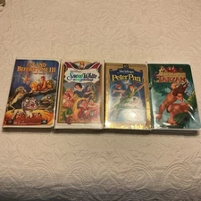 Lot of 4 Vintage Walt Disney Clamshell VHS Tapes