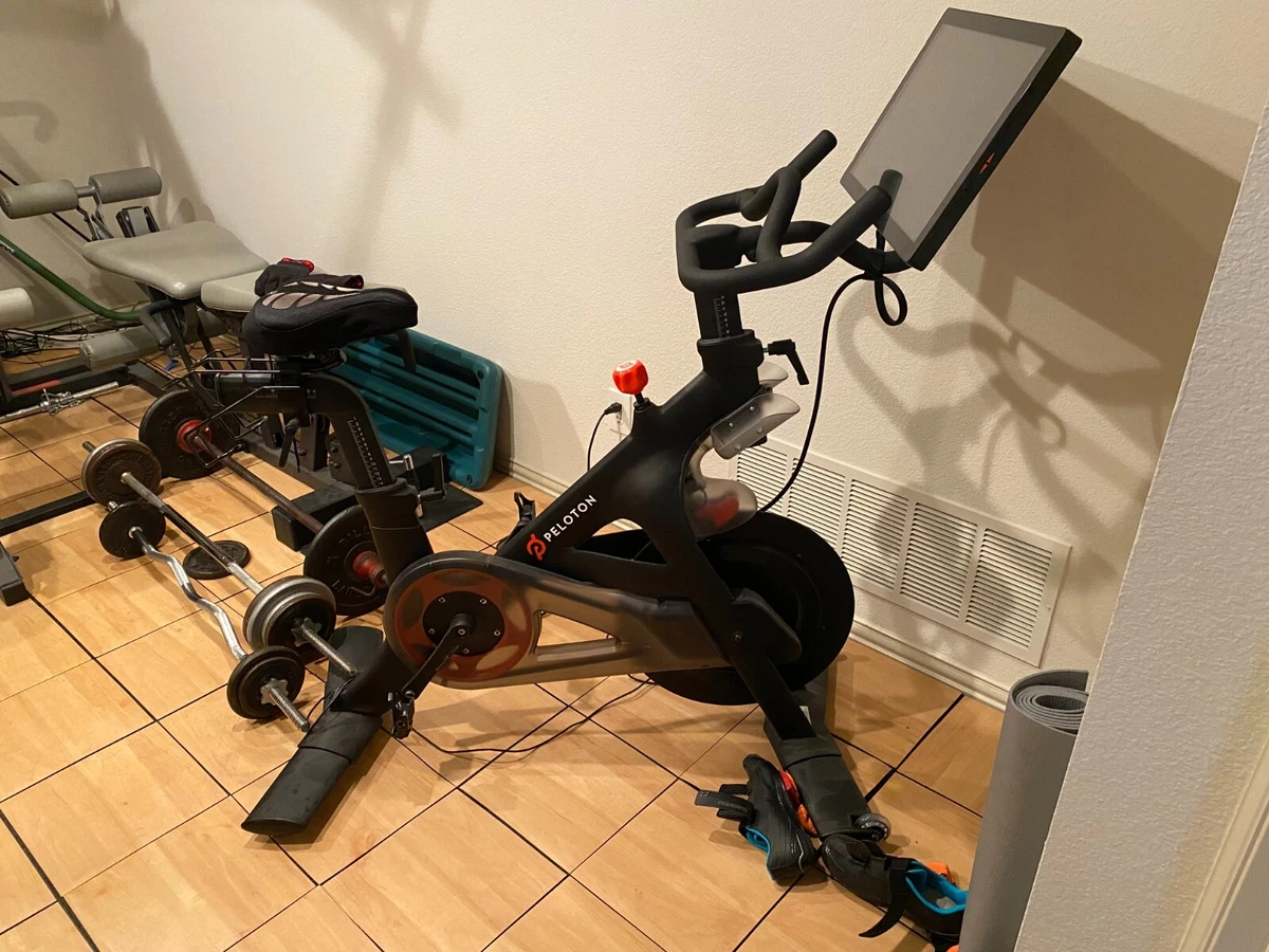 Peloton bike for sale barely used less than 30 rides total