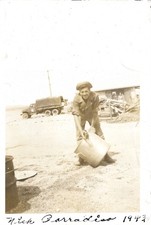 vintage photo 1943 WWII soldier id'd holding huge pot US army truck in back