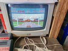 Console GX 4000 - Amstrad GX4000 2 manettes et le jeu d'origine burning rubber H