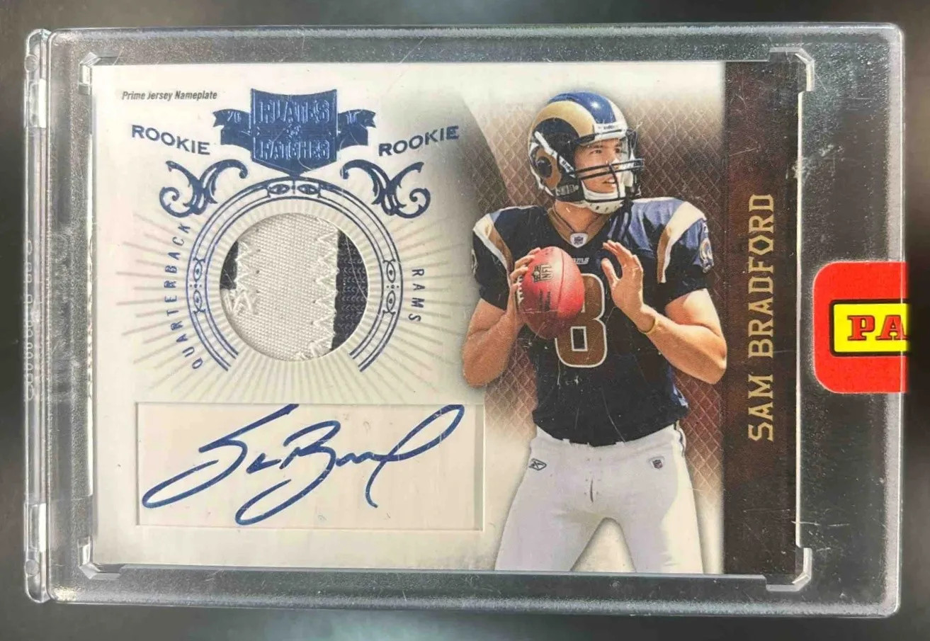 2010 Plates and Patches (Patch Auto) Sam Bradford /25 RAMS (sealed)