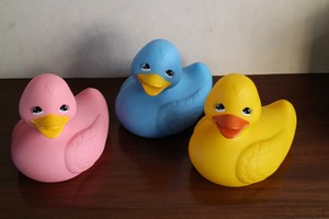 pink and blue rubber ducks