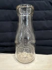 Vintage Embossed One Pint Liquid Glass Bottle From Philadelphia, PA