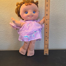 12in Baby Doll Girl Light Complexion Wavy Brown Hair Blue Eyes Purple Dress