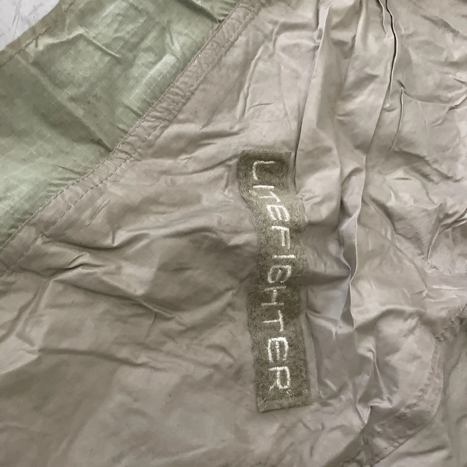 DEFECTUOSO USGI Litefighter 1 tienda refugio individual bronceado sin postes ni St G3D Foto 2 de 3