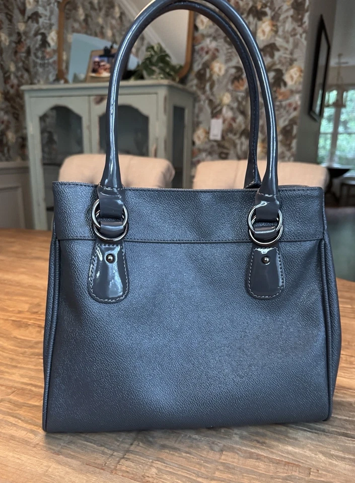 Cartera Brics de cuero gris con doble asa charol Turnlock de lujo Foto 3 de 4