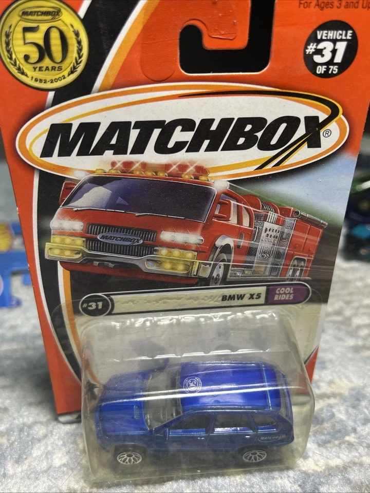 Matchbox BMW X5 en vehículo azul #3 de 75 con buen estado de embalaje Foto 2 de 4