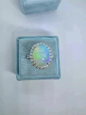 Anillo de compromiso natural con halo de corte ovalado de ópalo de fuego de 3 quilates enchapado en oro blanco de 14 quilates plateado