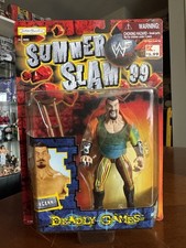 WWF Jakks BCA Deadly Games Oddities Kurgann in tie-dye. On card, unopened.