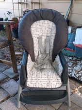Gray and White High Chair with Arrow Pattern Cushion and Safety Harness