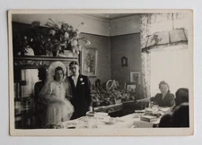 Bride and groom in dining room, interior - old photo snapshot 1947