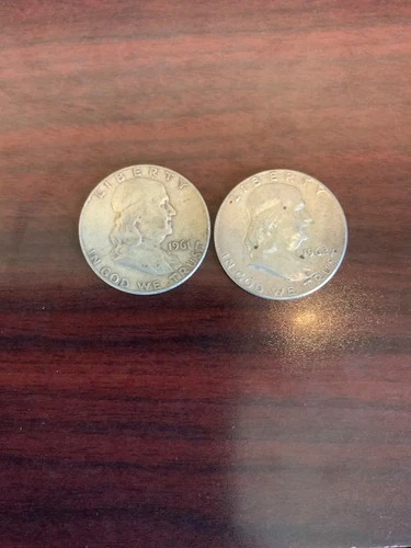 Lot of 2 silver Benjamin half dollar coins - fair condition