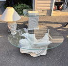 Oval Glass Top Coffee Table Dolphin Base White/Clear 45x32x16 in — photo 1