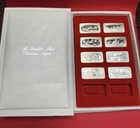 New ListingFranklin Mint 1984-1991 Christmas Silver Ingot 8 Bar Set.