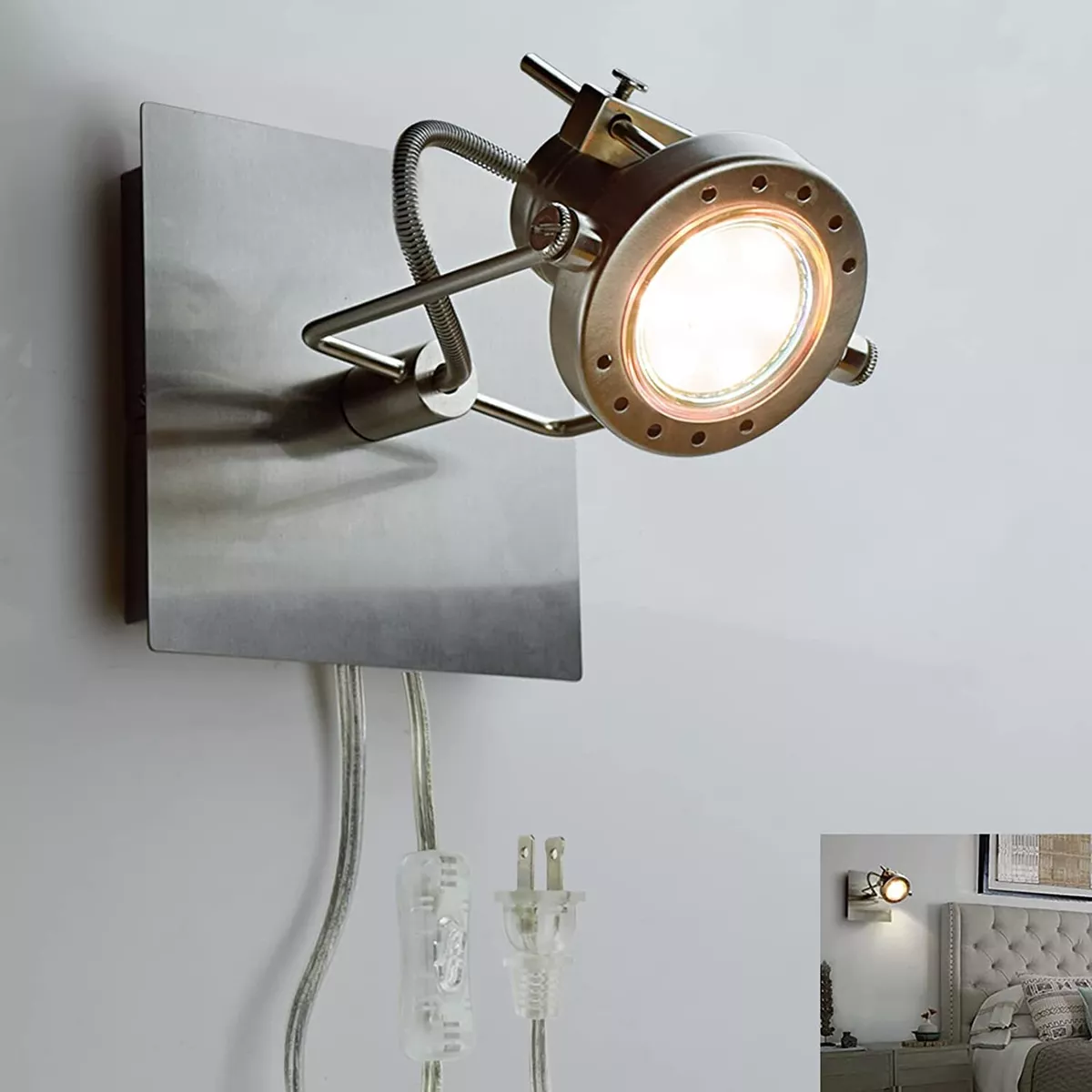 Wall mounted light fixture with plug outlet
