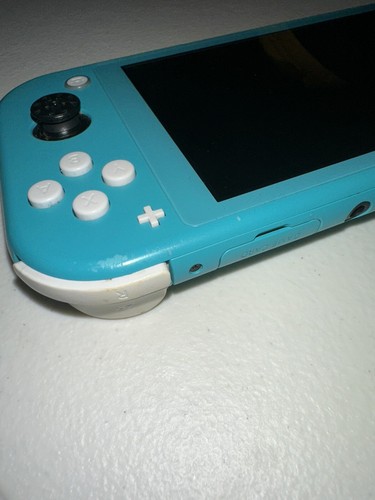 Nintendo Switch Lite 32GB Console - Turquoise Includes 4 Games Animal Crossing.. - Picture 8 of 16