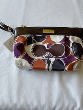 Coach Multicolor Logo Wristlet with Wrist Strap and Zip Closure, Small
