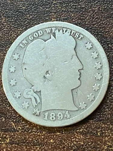 1894 o barber silver quarter a very fine coin . pluse a silver surprise