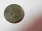 1865 Indian Head Penny in about XF. Liberty, diamonds and rim. Corrosion.