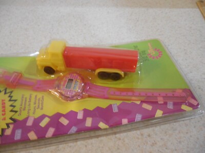 PEZ 1997 Watch LCD Pink Strap & Yellow Red Semi Truck Quartz UTI