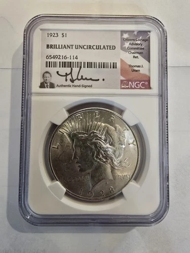 1923 PEACE DOLLAR- BRILLIANT UNCIRCULATED-THOMAS J. URAM SIGNED NGC