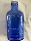 Vtg Embossed Cobalt Blue Milk of Magnesia Glass Bottle 1930s