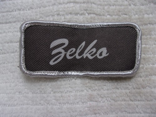 ZELKO  USED SILK SCREEN VINTAGE SEW ON NAME PATCH TAGS WHITE ON GREY