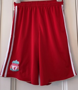 red adidas football shorts