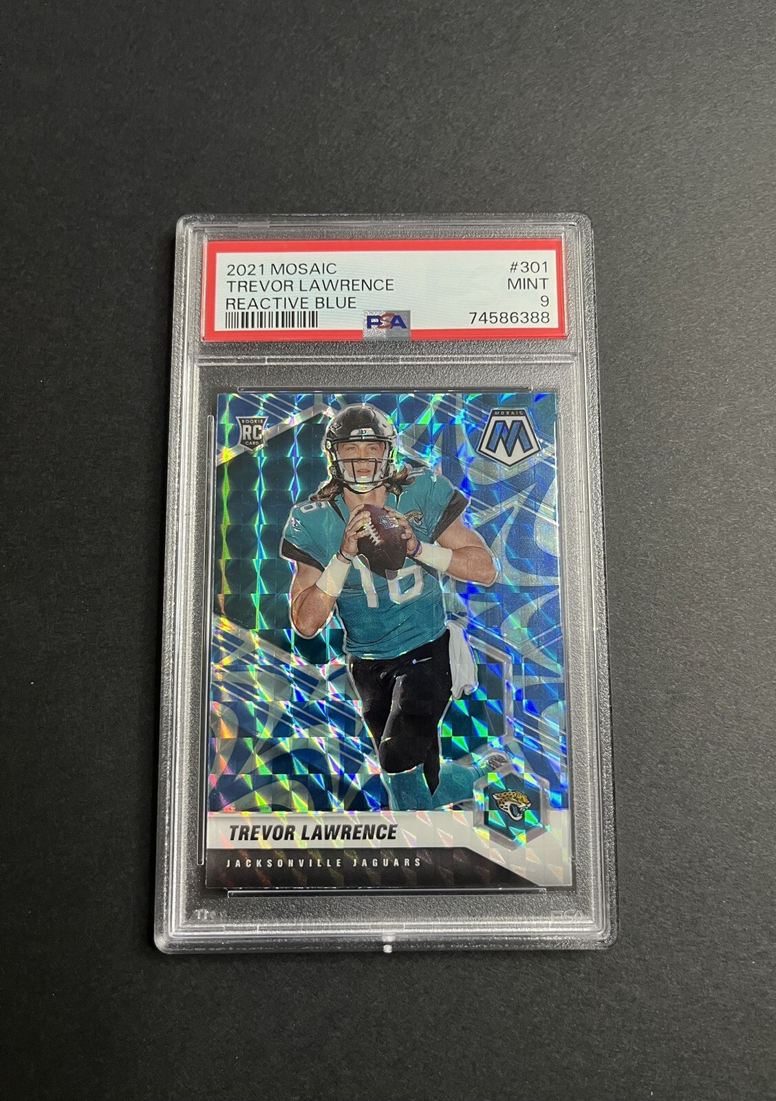 2021 Panini Mosaic Reactive Blue Prizm #301 Trevor Lawrence RC Rookie PSA 9 MINT