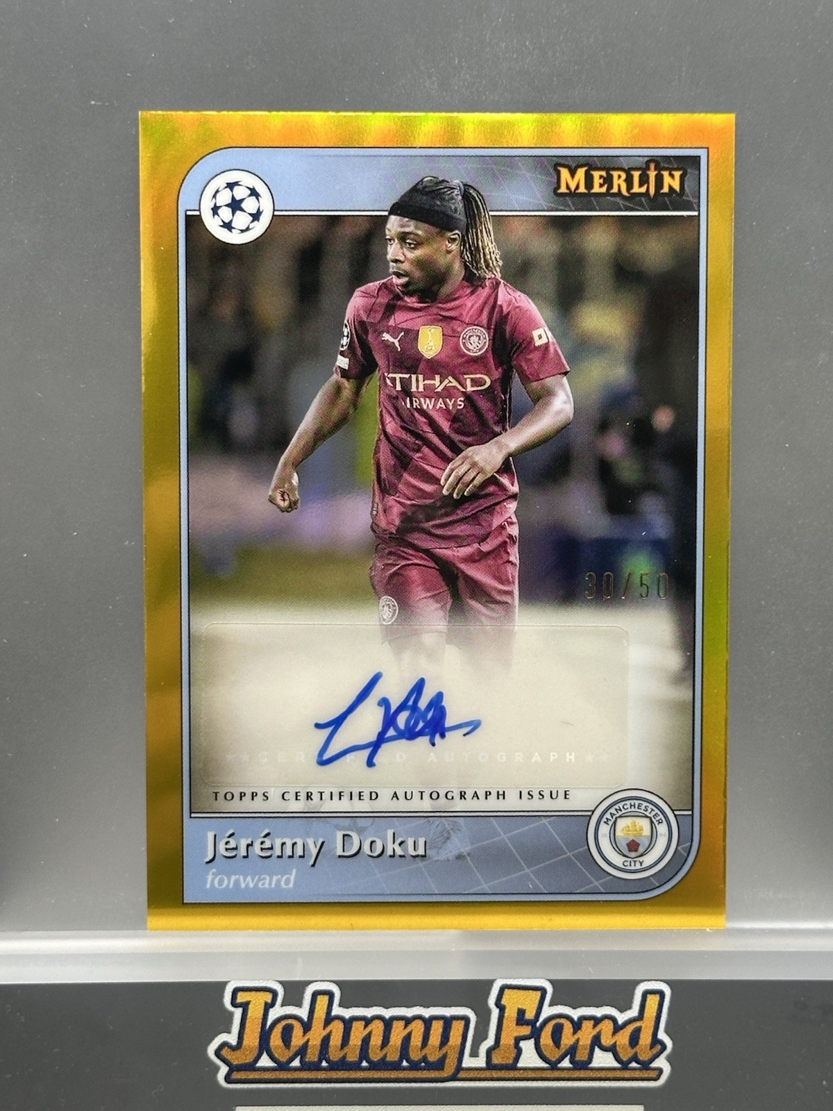 Jeremy Doku 2024-25 Topps Chrome Merlin Gold Refractor Auto 30/50 #AU-JD