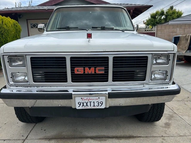 グリーンライト '87 GMC ジミー リフテッド 紺／白 1987 GMC Jimmy Sierra Classic, Dark Blue - Greenlight 35190C/48