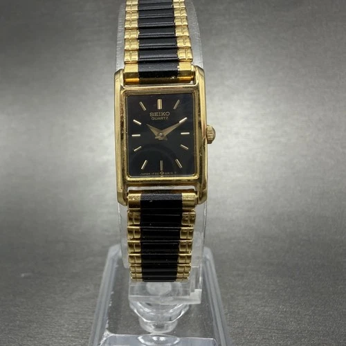 Seiko Tank Watch Women 14mm Black Dial Gold Tone Rectangle 1F20-5A69 New Batt TH