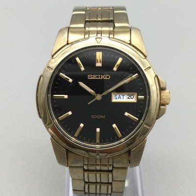 Seiko Mens Watch 39mm Black Dial Gold Tone 7N43-0AZ0 Day Date New