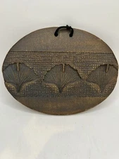 Pottery Wall Plaque With Embedded Fan Design
