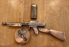 VTG NOS THOMPSON COPPER COLORED MACHINE GUN TOMMY GUN TABLE LIGHTER UNIQUE