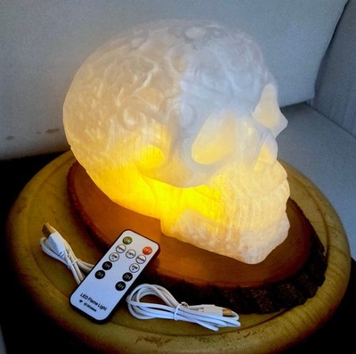 Glowing 3D Hollow Skull Lamp with Remote-Controlled Flame LEDs on Natural Wood S