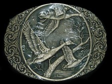 UD13146 NOS VINTAGE 1980s DUCKS ART COMMEMORATIVE SOLID BRASS BELT BUCKLE