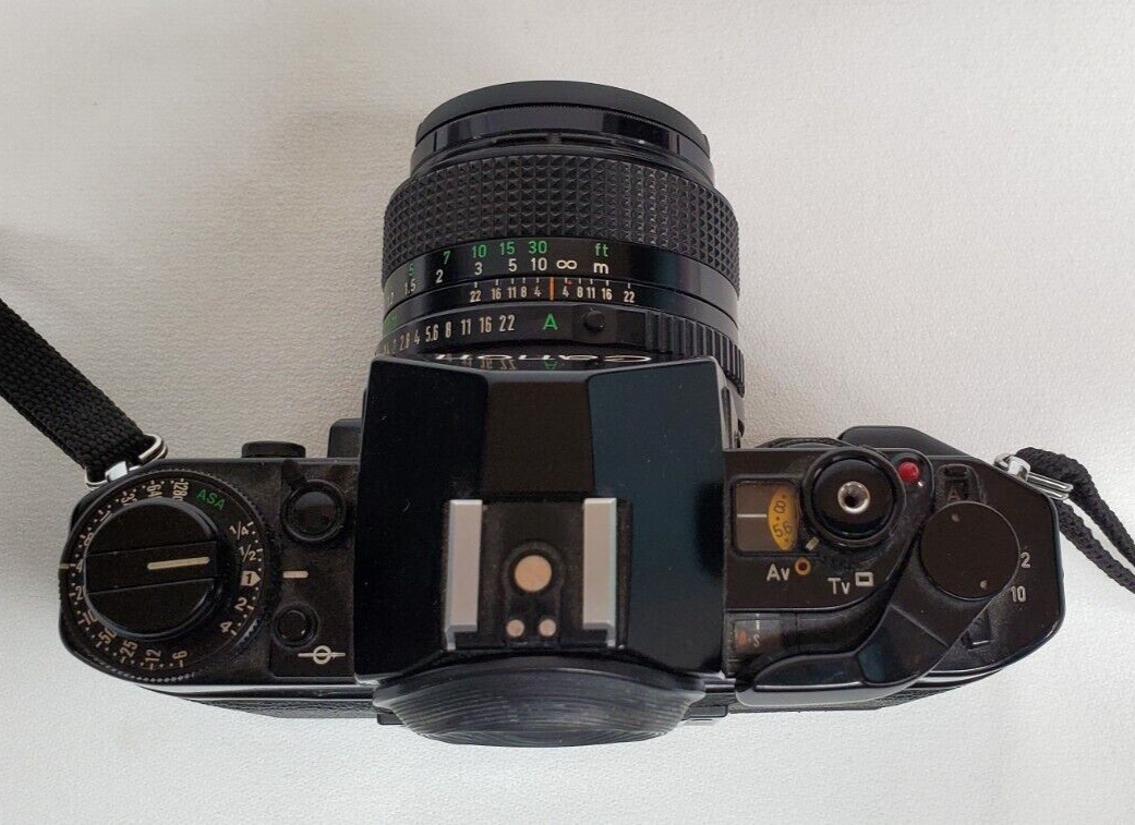 Vintage CANON A-1 35mm FILM CAMERA w 50mm Lenes & Manual Vintage CANON A-1 35mm FILM CAMERA w 50mm Lenes & Manual