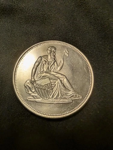 One Troy Oz .999 Fine Silver round with Seated Liberty OBV, Shield REV