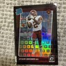2021 Optic Dyami Brown Rated Rookie Black /25 Commanders