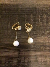 Set of White Globe clip earrings