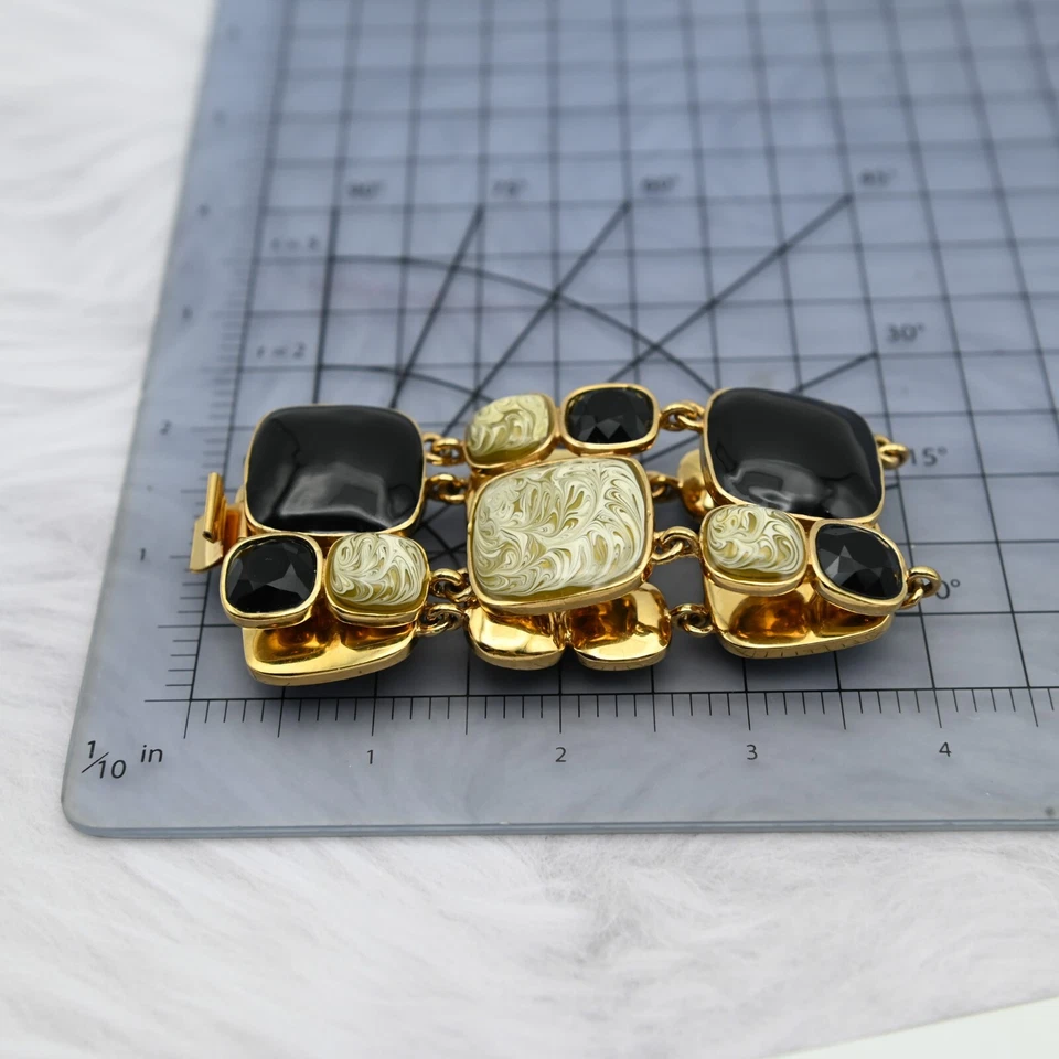 Brazalete Kate Spade NY Ancho Negro Cristal Esmalte Tostado Remolino 7 1/2" Tono Dorado Foto 4 de 4