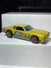 Vintage Hot Wheels Redline Monte Carlo Stocker Flying Colors 1/64 Diecast 1975