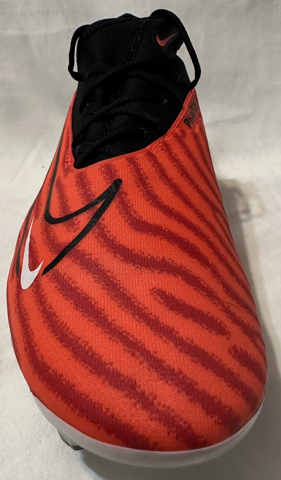 red and black nike soccer cleats