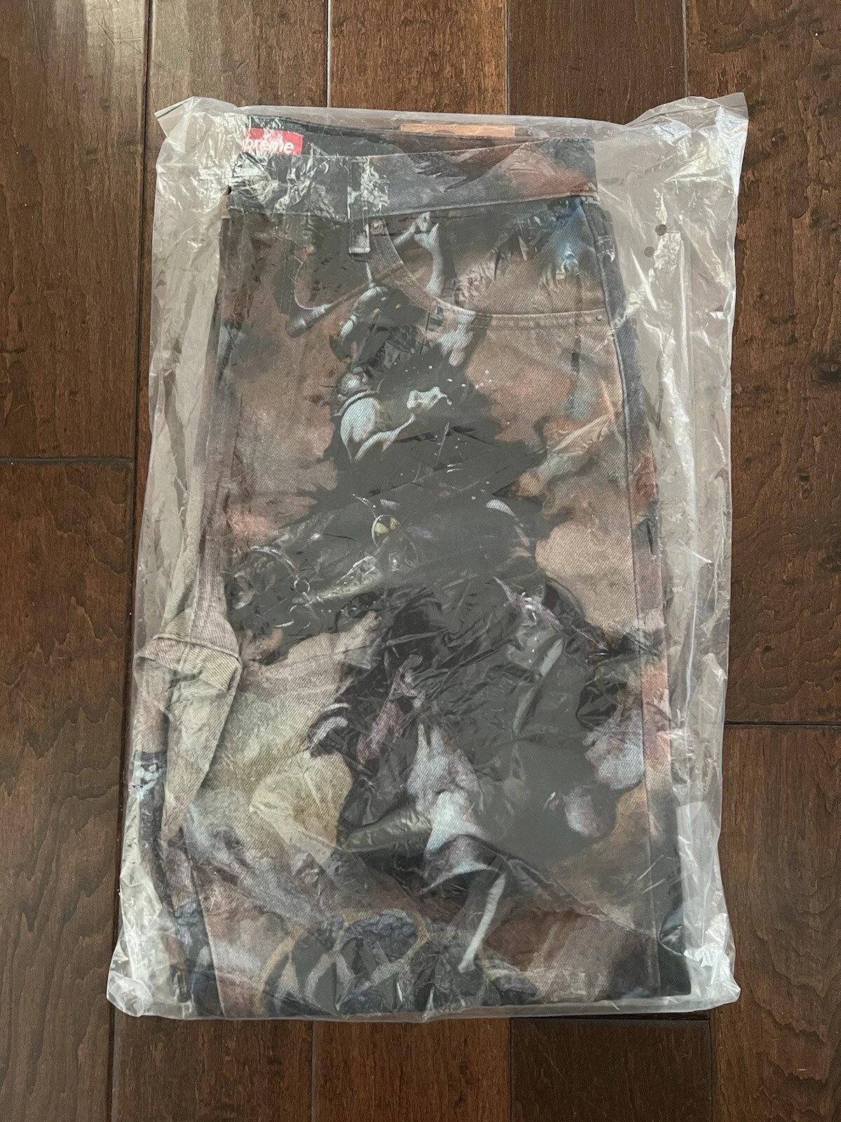 Jean denim multicolore Supreme FW24 Frank Frazetta coupe ample taille 34 neuf EN MAIN