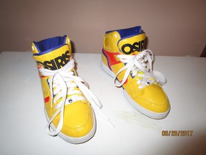 yellow high top tennis shoes