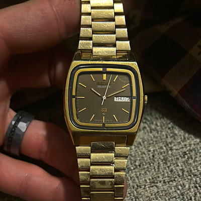 Seiko SQ Men's Quartz Day/Date 35mm Gold Tone Square Black TV Dial