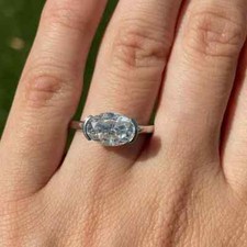 2.3 Ct Oval Simulated East West Half Bezel 14k White Gold Finish Engagement Ring