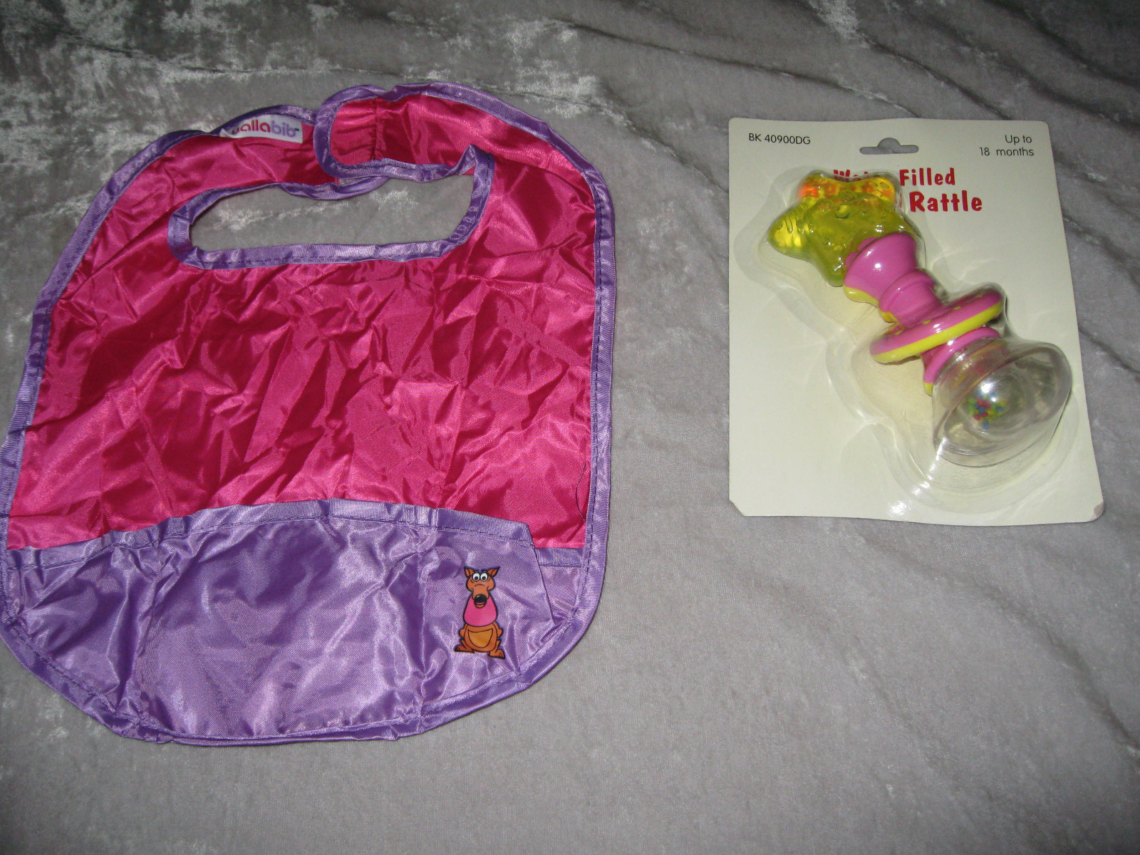 Pink Travel Reusable Bib Kangaroo Pocket Water Filled Rattle Baby Play Feed NEW!